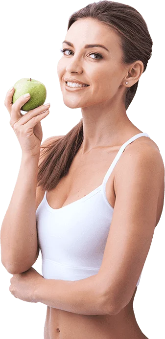 Mujer feliz con manzana mostrando los resultados de Turboslim — figura definida, energía y autoestima recuperada sin dietas estrictas